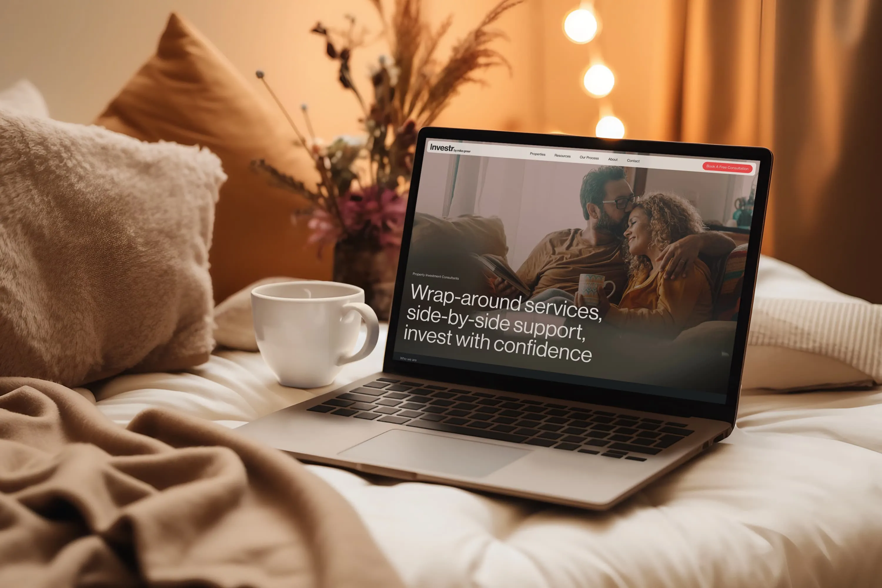 Website shot on a laptop in a cozy home.